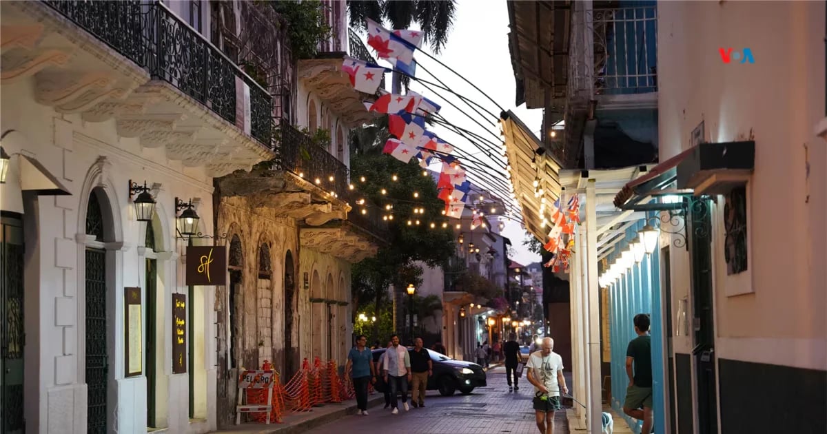 A Casco Antiguo street in Panama City with colourful hanging sombreros