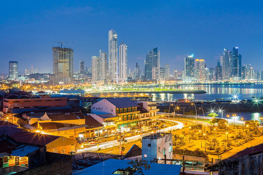 Panama City skyline across the bay at sunset
